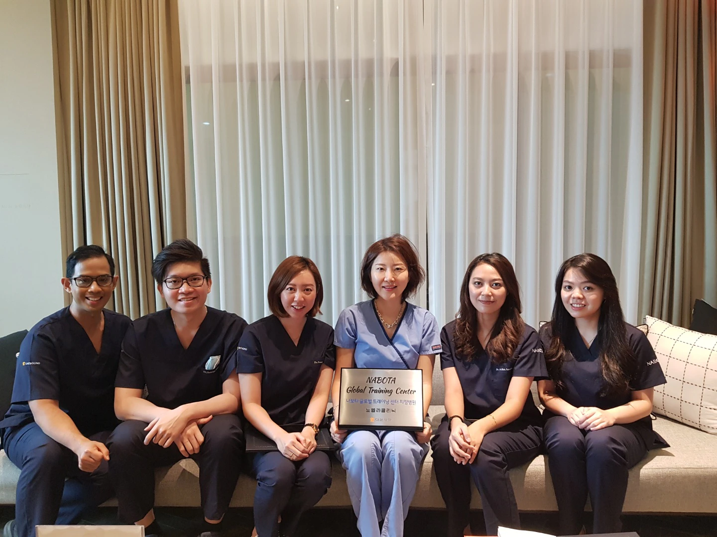 Dr. Jung Im No with physicians at the Nabota Global Training Center